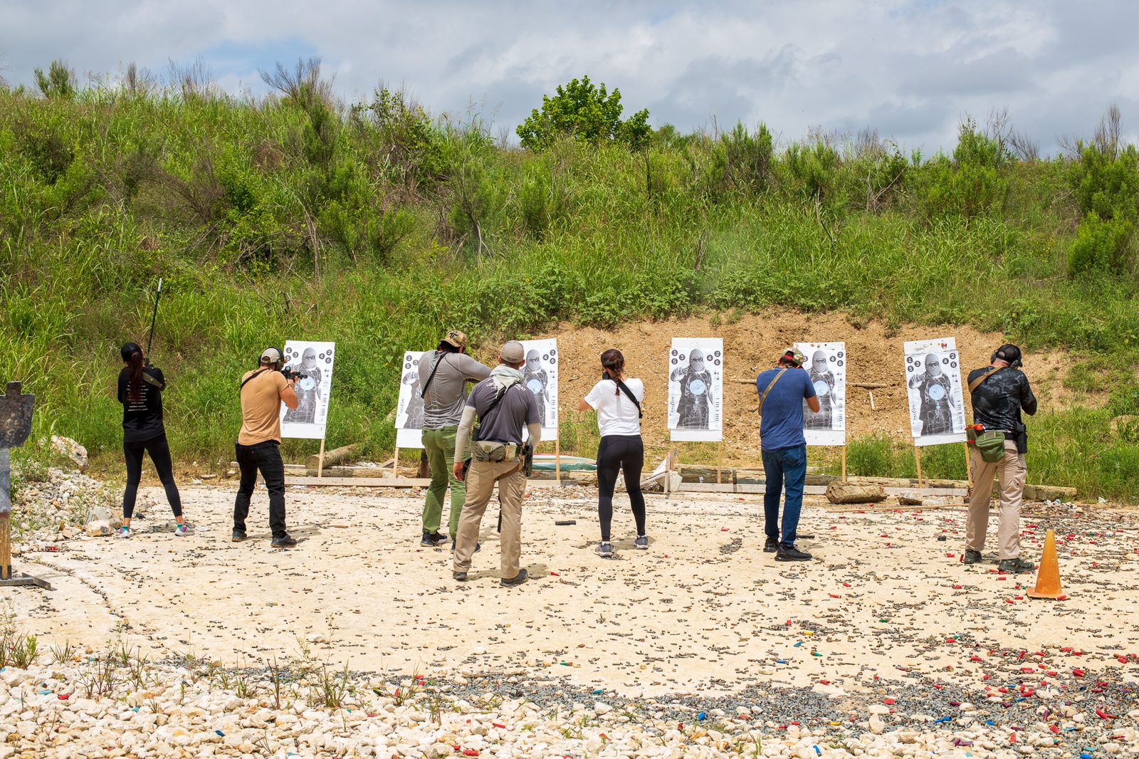 Corporate group on the firing line at Tactical Fitness Austin team building event