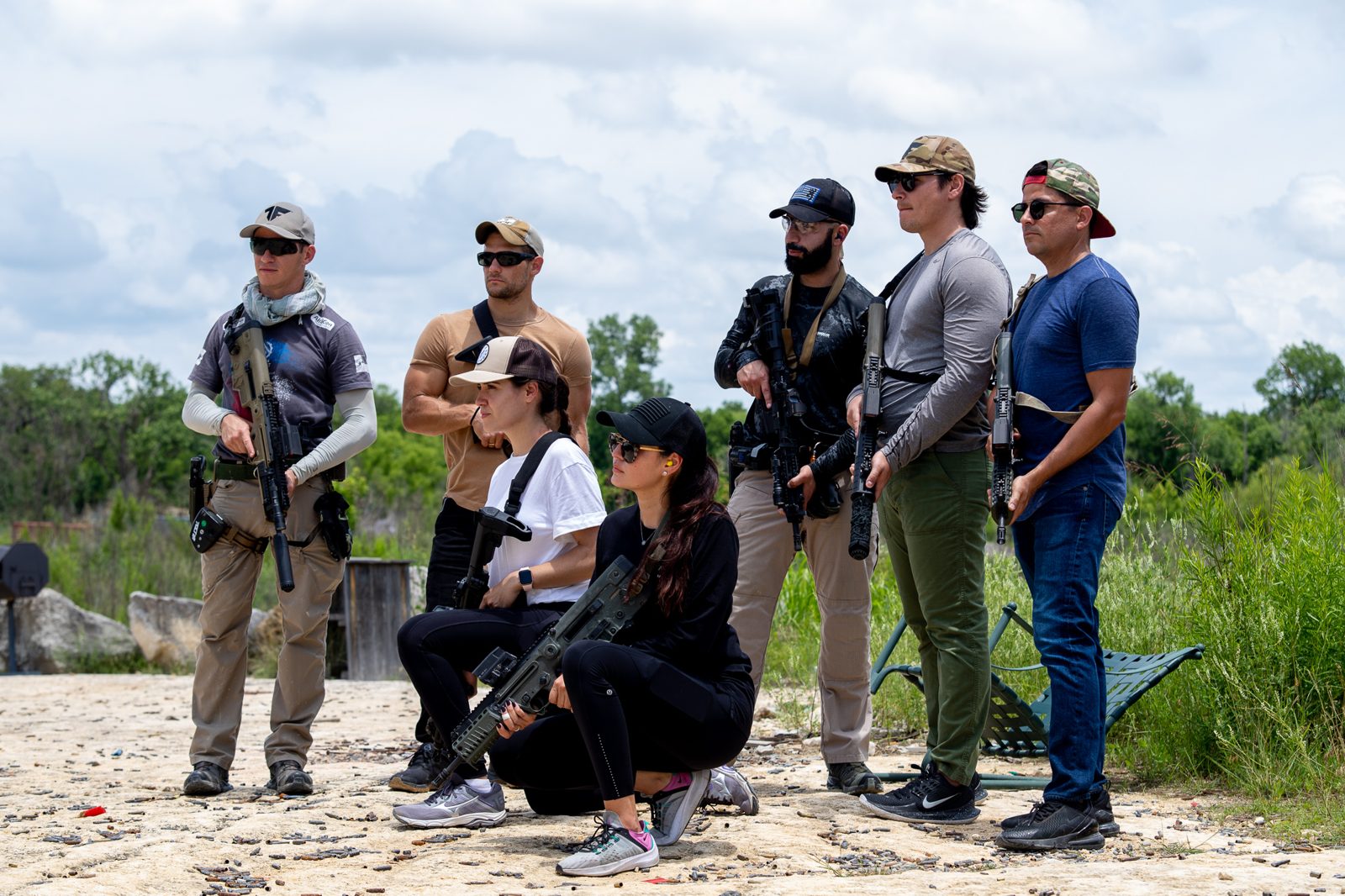 Corporate team with rifles at Tactical Fitness Austin team building experience