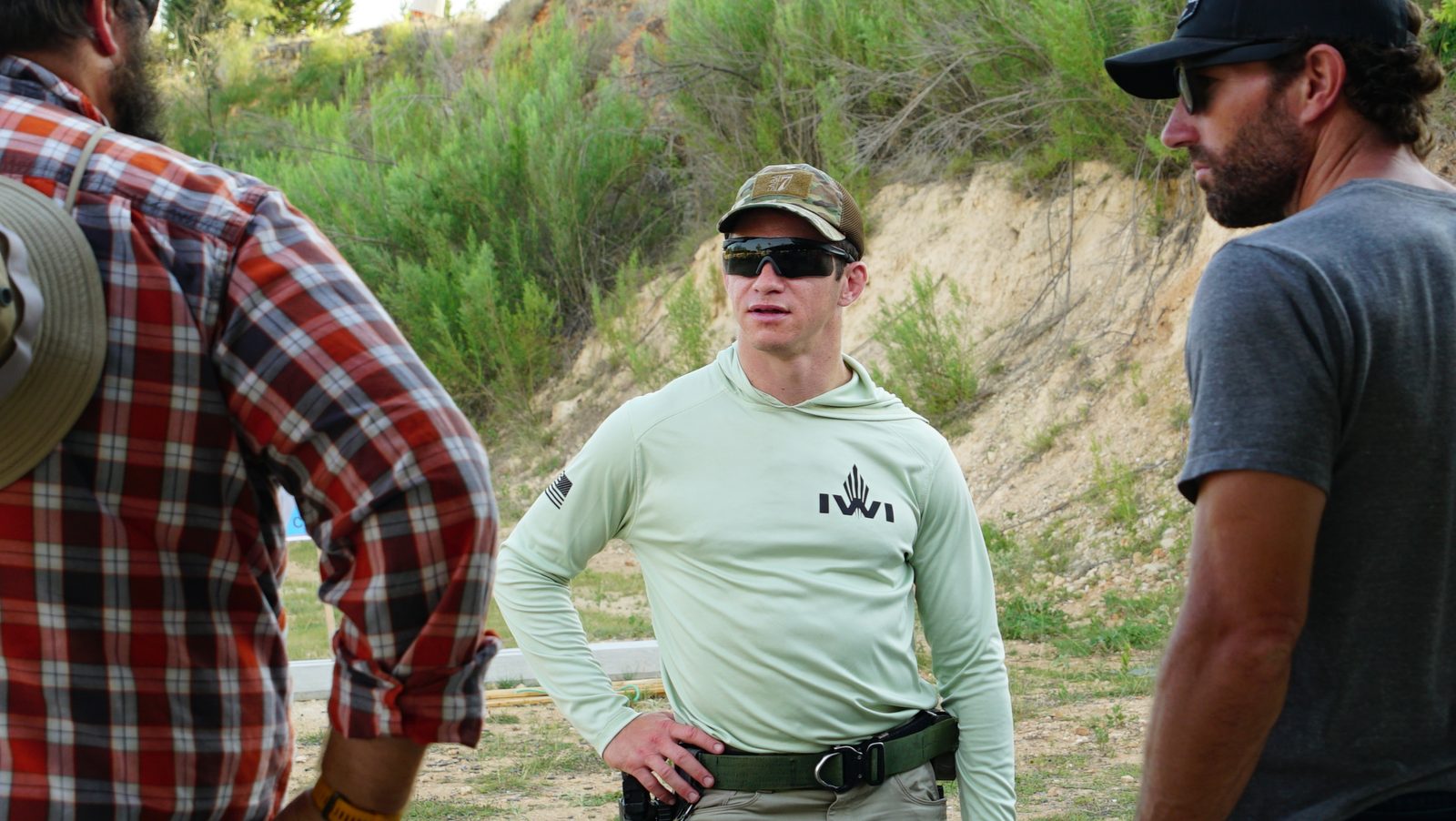 Executive offsite group debrief at Tactical Fitness Austin outdoor range