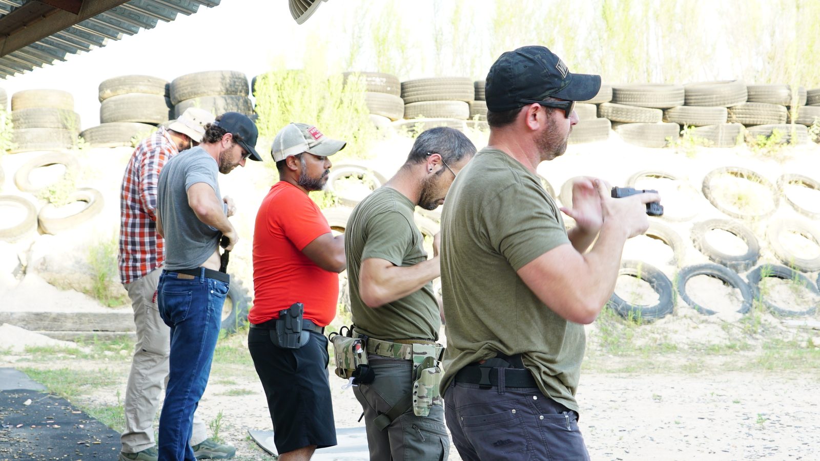 Private firearms instructor coaching student Austin