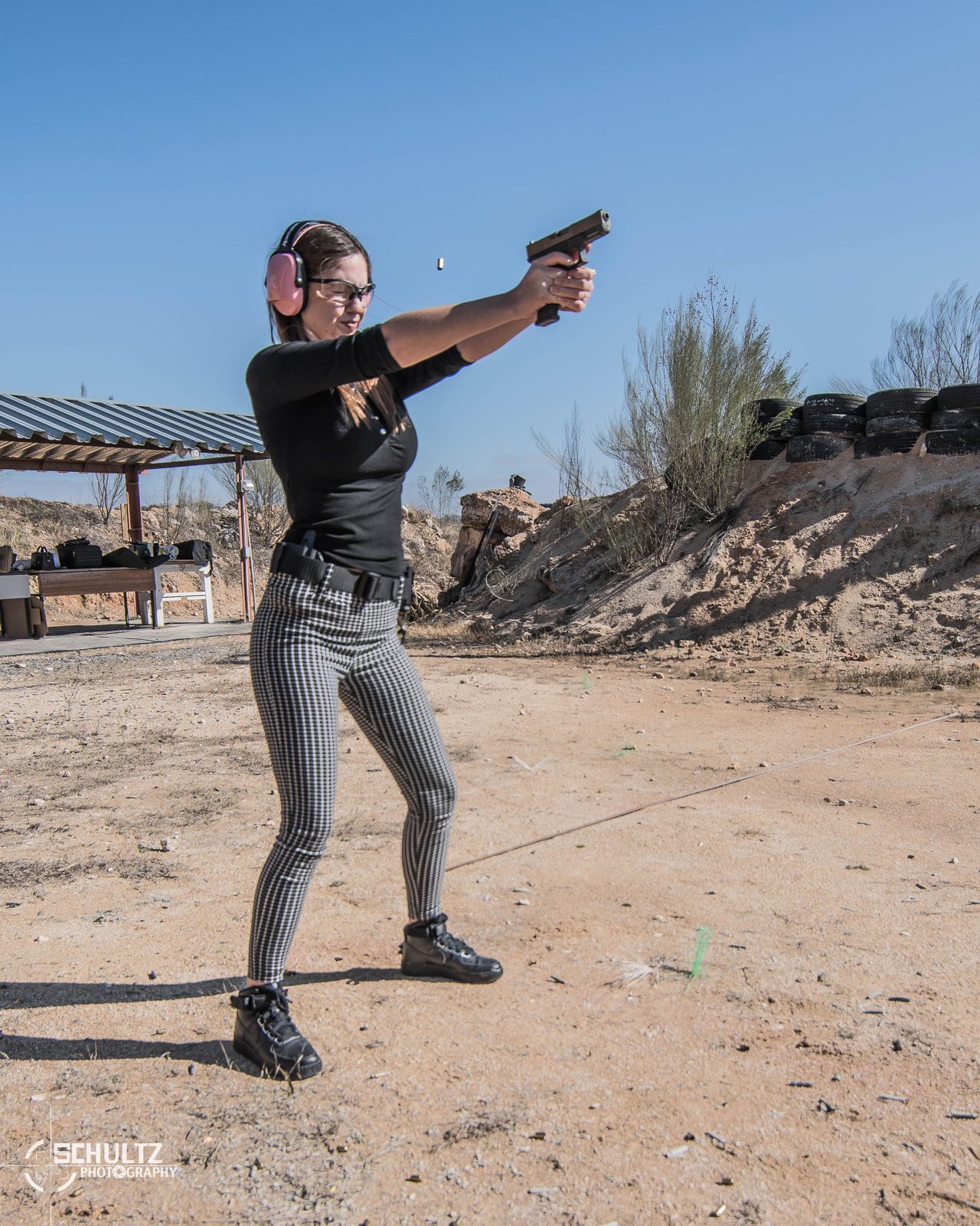 Women's firearms training Austin — proper pistol shooting stance