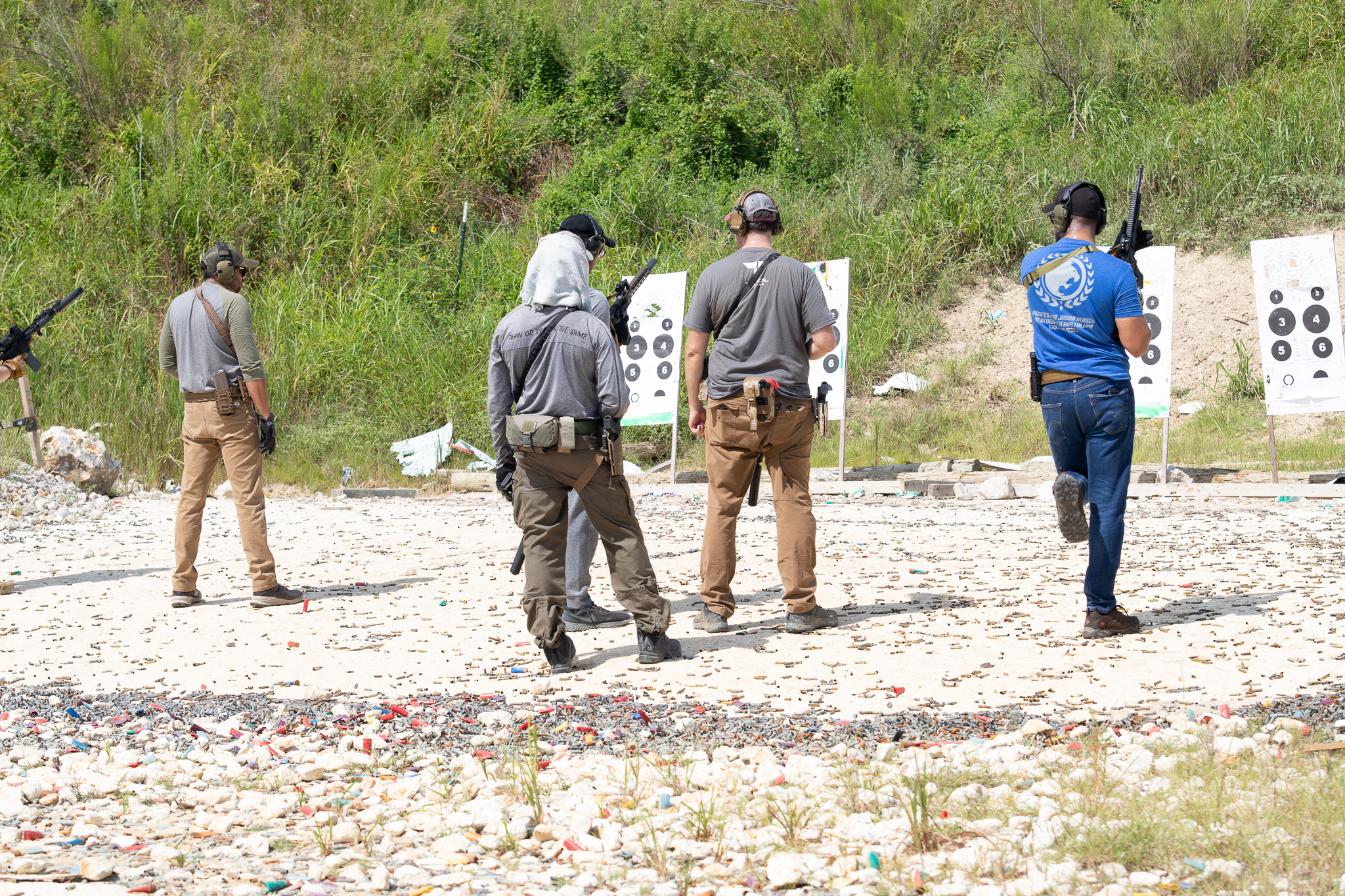 Working the gun on the live-fire range.