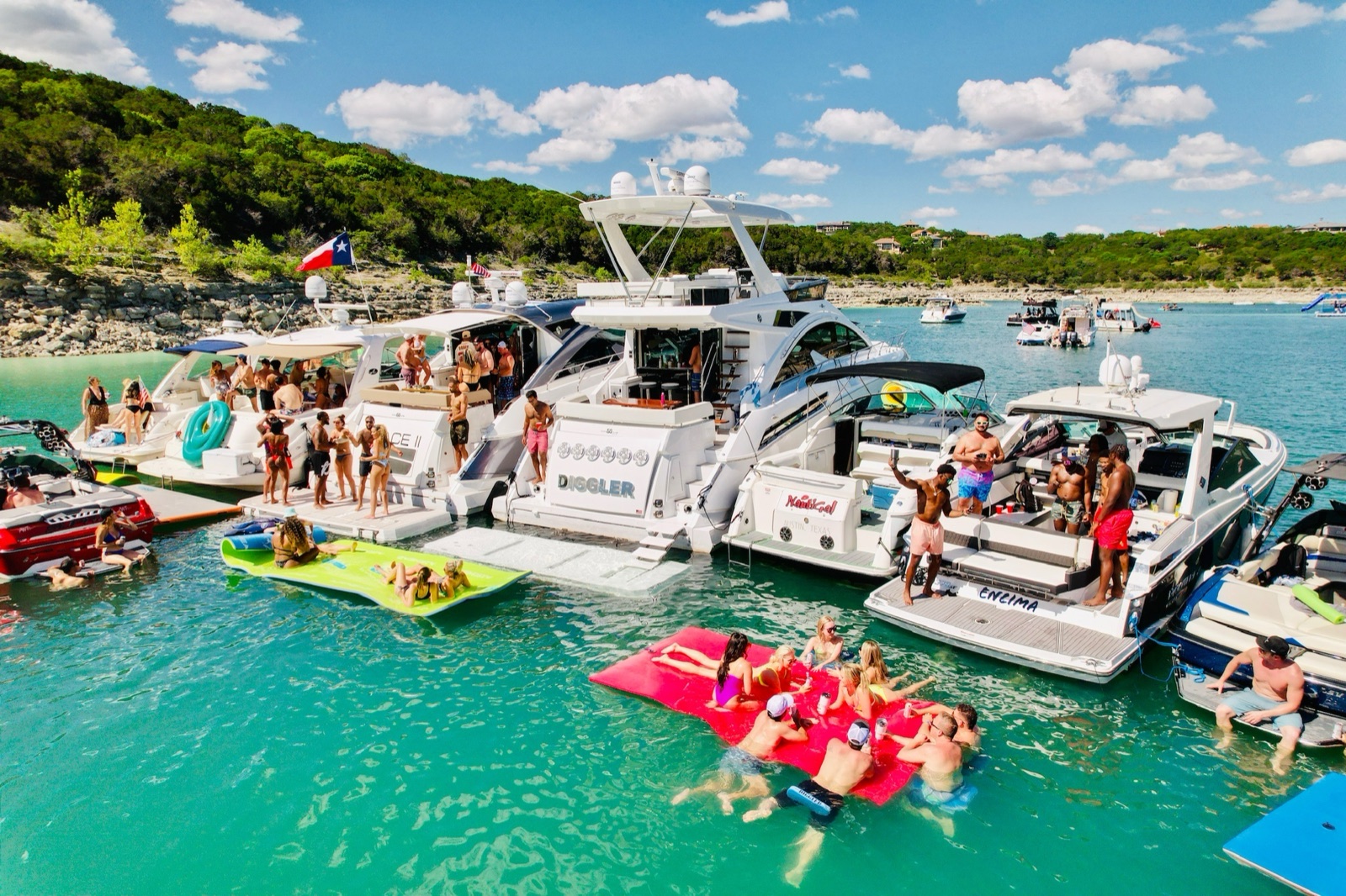Boats rafted up in a Lake Travis cove near Austin
