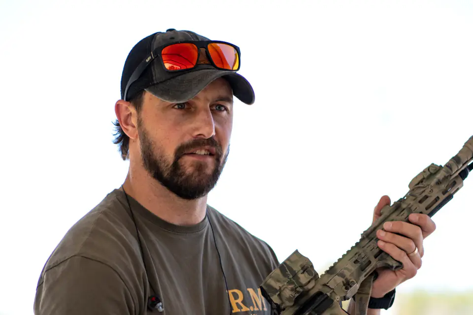 Instructor with a rifle at Tactical Fitness Austin